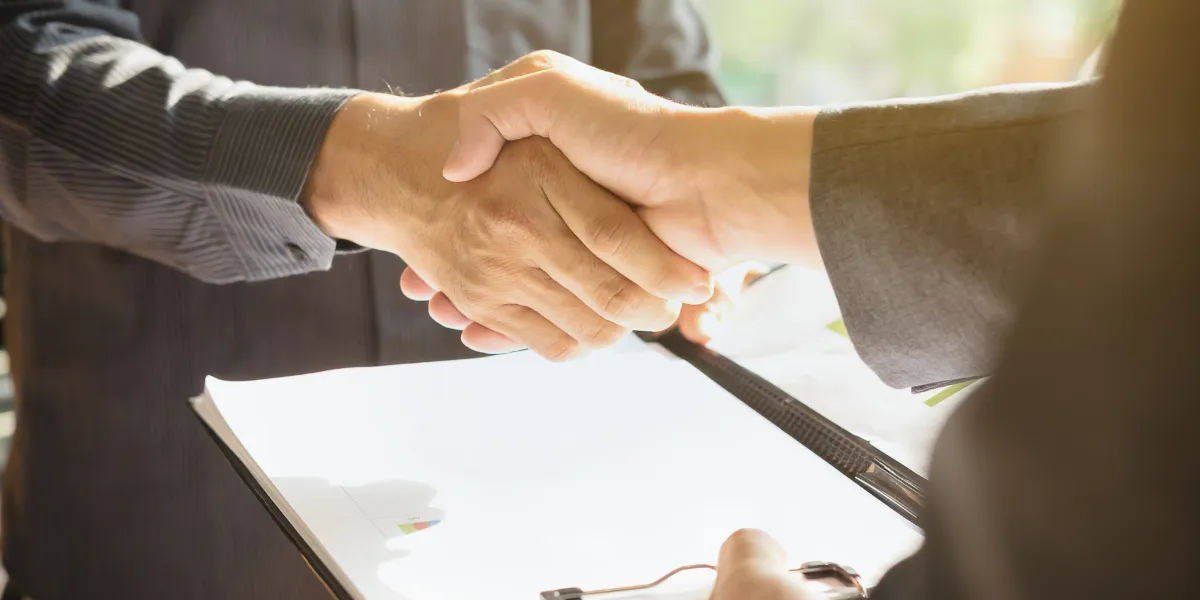 Online notary witnessing signatures on a lease agreement.