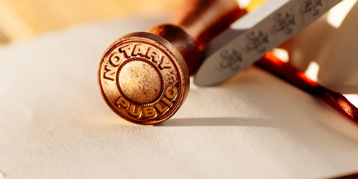 BlueNotary pricing explained, including notarization costs, extra signer and stamp fees, witness options, and business plans.